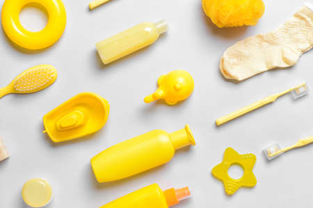 Set of bath accessories for baby on light background
