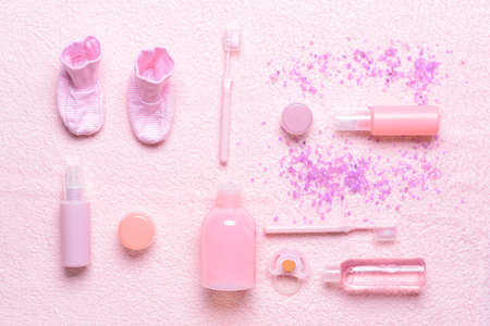 Set of bath accessories for baby on color backgroundの写真素材