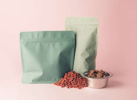 Tasty pet food on color backgroundの写真素材