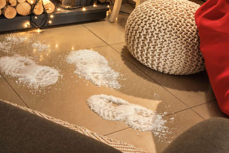 Footprints of Santa on floor in roomの写真素材