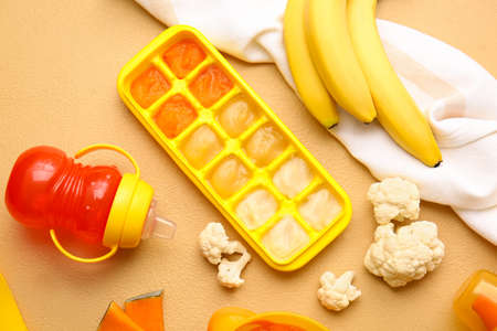 Composition with healthy baby food on color backgroundの写真素材