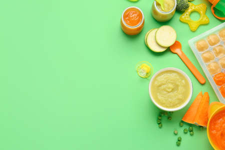 Composition with healthy baby food on color backgroundの写真素材