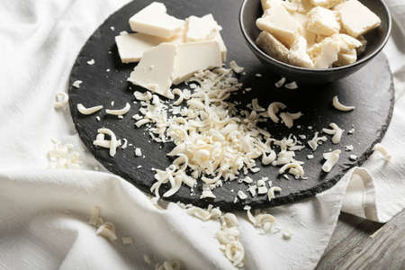 White chocolate shavings on table