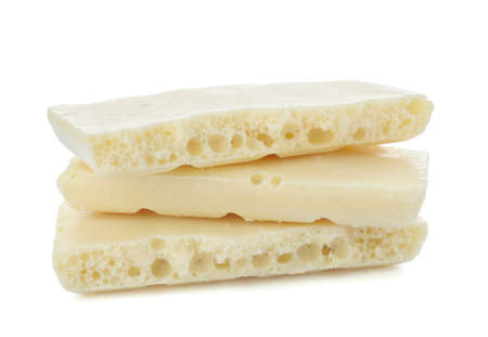 Pieces of chocolate on white background