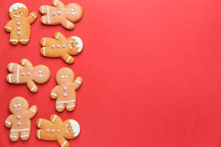 Tasty gingerbread cookies on color backgroundの写真素材