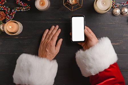 Santa Claus with empty letter at tableの写真素材