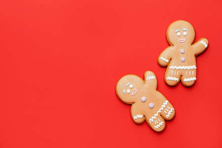 Tasty gingerbread cookies on color backgroundの写真素材