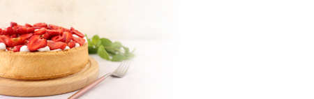 Tasty strawberry pie on light background with space for textの写真素材