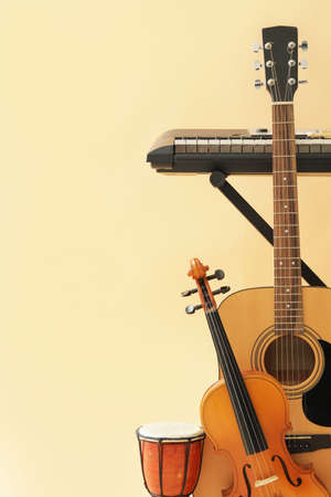 Different musical instruments on color backgroundの写真素材