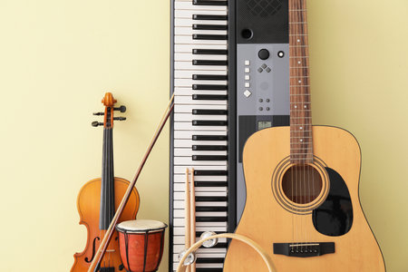 Different musical instruments on color backgroundの写真素材