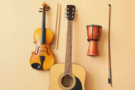 Different musical instruments on color backgroundの写真素材