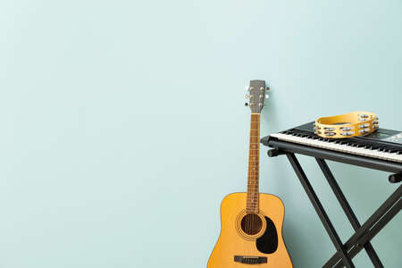 Different musical instruments on color backgroundの写真素材