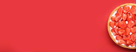 Tasty strawberry pie on color background with space for textの写真素材