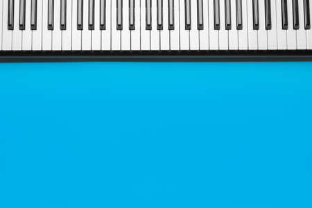 Modern synthesizer on color backgroundの写真素材