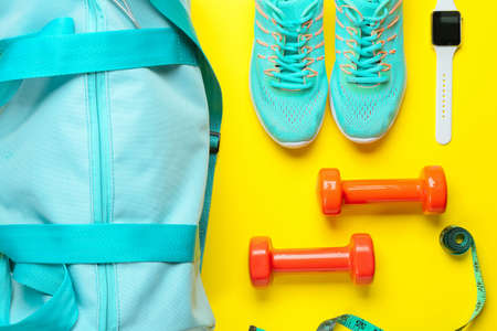 Composition with bag and sports equipment on color background, closeupの写真素材