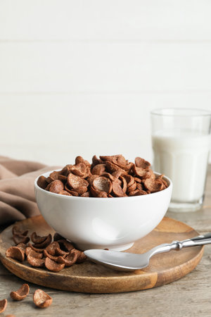 Composition with tasty cornflakes on wooden tableの写真素材