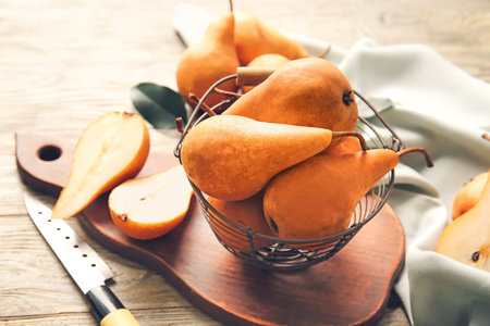 Fresh ripe pears on wooden backgroundの写真素材