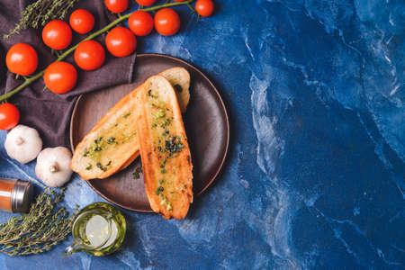 Composition with toasted bread on color backgroundの写真素材