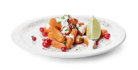 Plate of tasty baked carrot on white background