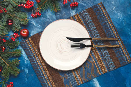 Beautiful table setting for Christmas celebrationの写真素材