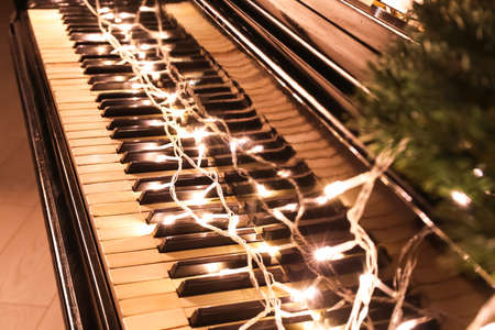 Grand piano with Christmas decor, closeupの写真素材