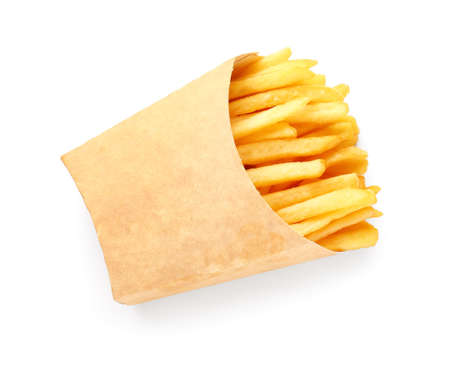 Paper box with tasty french fries on white background