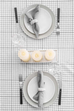 Beautiful table setting with candles