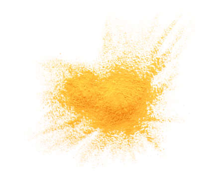 Heap of turmeric powder on white backgroundの写真素材