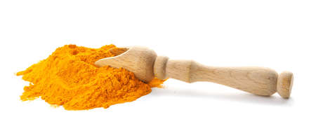 Scoop with turmeric powder on white backgroundの写真素材
