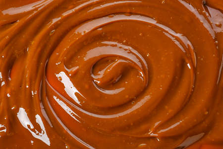 Boiled condensed milk as backgroundの写真素材