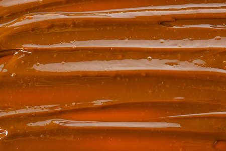 Boiled condensed milk as backgroundの写真素材