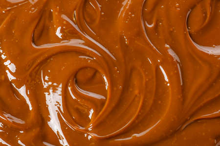 Boiled condensed milk as backgroundの写真素材