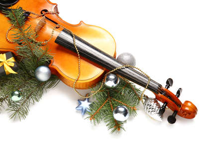 Violin and Christmas decor on white backgroundの写真素材