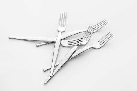 Stylish forks on light backgroundの写真素材