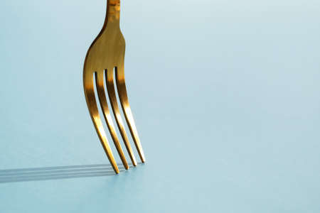 Stylish fork on color backgroundの写真素材