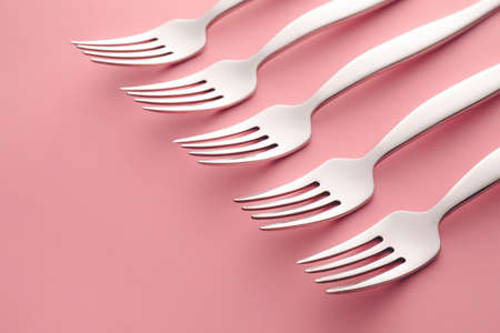 Stylish forks on color backgroundの写真素材