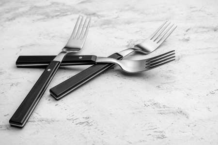Stylish forks on light backgroundの写真素材
