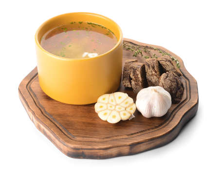 Bowl with tasty garlic soup on white backgroundの写真素材