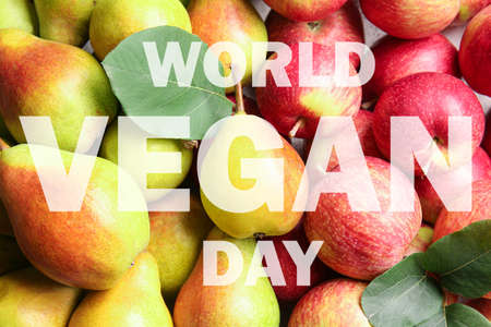 Greeting card for World Vegan Day with fresh fruitsの写真素材