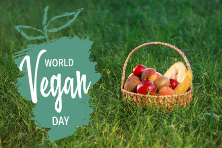Greeting card for World Vegan Day with fresh fruitsの写真素材
