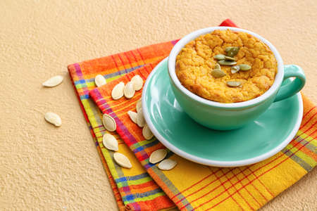 Tasty pumpkin pudding on color backgroundの写真素材