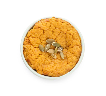 Tasty pumpkin pudding on white background