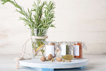 Composition with different spices on light wooden backgroundの写真素材