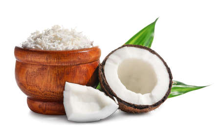 Bowl with coconut flakes on white backgroundの写真素材