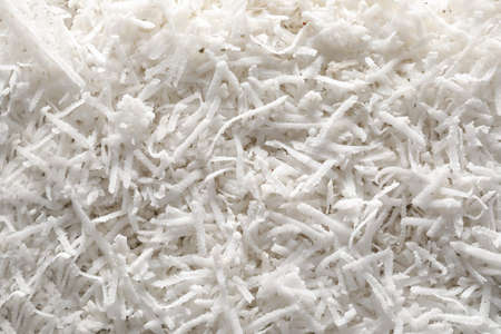 Tasty coconut flakes as backgroundの写真素材