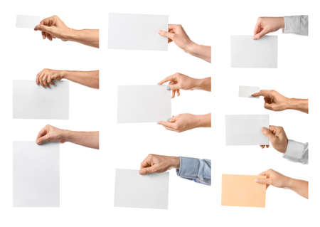 Human hands with blank sheets of paper on white backgroundの写真素材