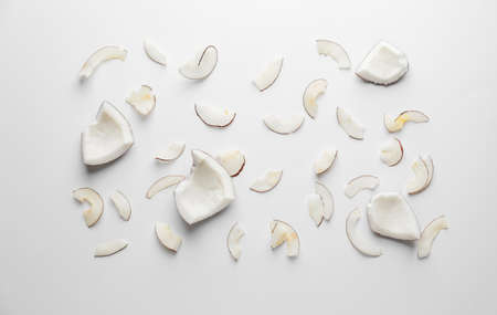 Tasty coconut chips on light backgroundの写真素材