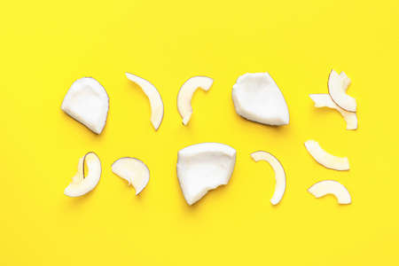 Tasty coconut chips on color backgroundの写真素材