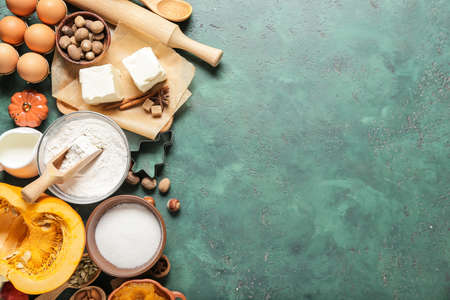 Ingredients for preparing pumpkin pie on color backgroundの写真素材