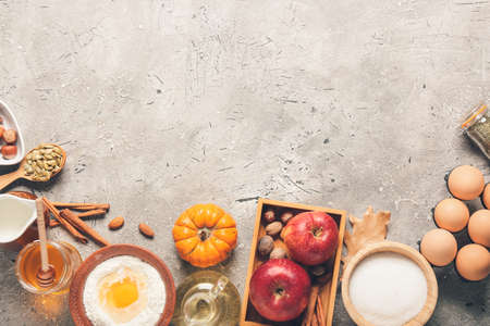 Ingredients for preparing pumpkin pie on grunge backgroundの写真素材